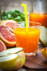 Juice of apples and red grapefruit.