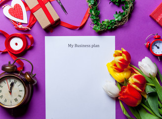 tulips and paper with words My Business Pan