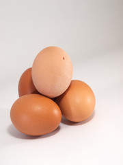 Brown eggs the background