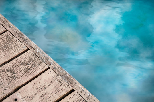 Waterfront / Waterfront walkway made of wood and reflex of building.