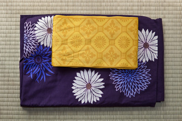 Folded yukata and obi, a light robe and sash belt in Tokyo, Japan