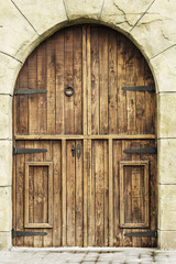 Fototapeta na wymiar rustic and wooden entrance door