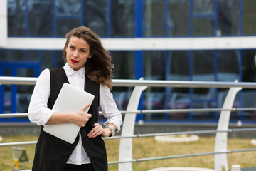 Business woman with a laptop