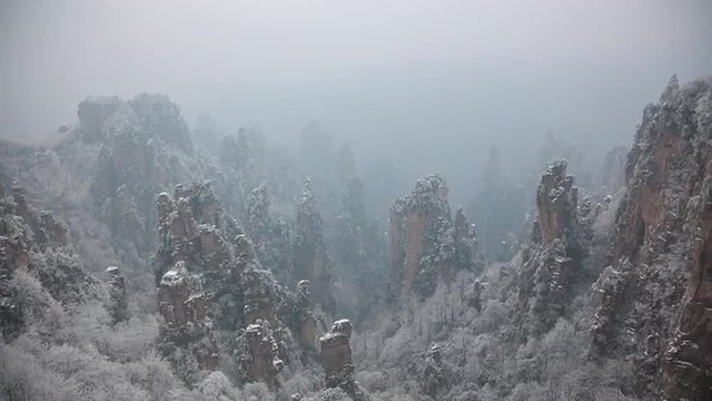 winter time chinese mountain park zhangjiajie full hd snowy panorama china
