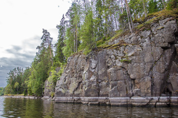 Beautiful rocky shores of Valaam. Religious place of monks on Valaam. Famous historical site on lake Ladoga with monastic monasteries. Archipelago Of Valaam, Russian Karelia. Tourist place and travel.