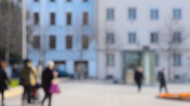 Pedestrians on a square in Linz Austria