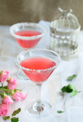 Cosmopolitan cocktail on white background