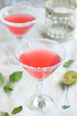 Cosmopolitan cocktail on white background