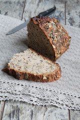 Freshly baked traditional bread on wooden table