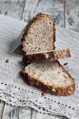 Freshly baked traditional bread on wooden table
