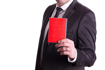 Unternehmer zeigt rotes Buch