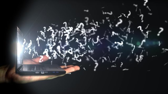 The question marks are emitted from the computer screen
