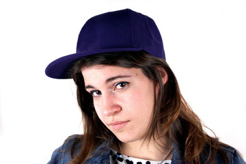 Studio shot of a young lady with blue hat