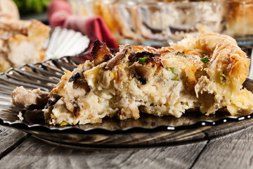 Slice of tart with chicken amd mushrooms