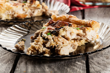 Slice of tart with chicken amd mushrooms