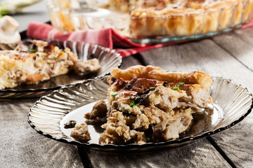 Slice of tart with chicken amd mushrooms