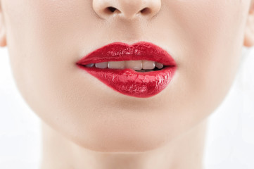 Obraz premium Cheerful young woman is deducing with her mouth