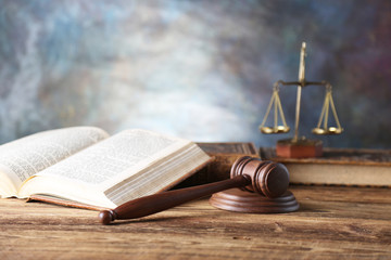 Law theme, mallet of judge, wooden gavel, books