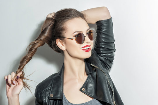 Beautiful young woman is evincing her sexuality