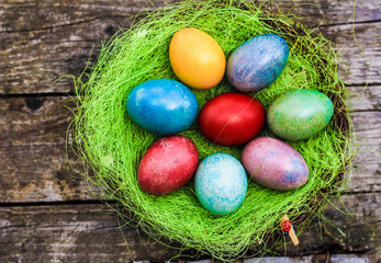 Fototapeta na wymiar Easter nest on wood