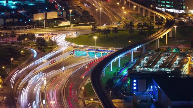 dubai city night traffic crossroad roof top panorama 4k time lapse uae 
