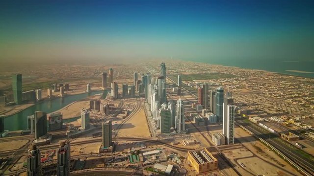 sunny day dubai city industrial part roof top panorama 4k time lapse uae
