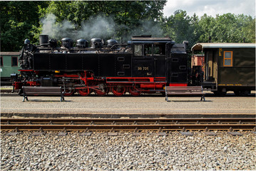 Old steam driven locomotive - 103881450