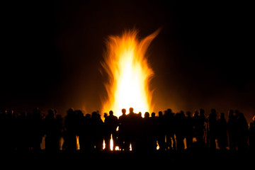 group of people at bonfire - Powered by Adobe