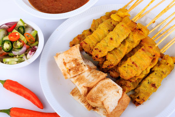 Traditional Thai style, Grilled pork satay with peanut sauce and toast.