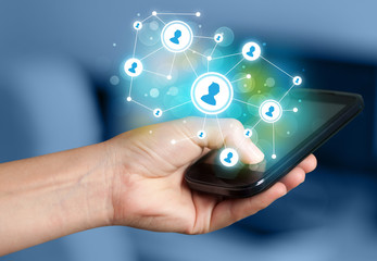 Finger pointing on smartphone, social network concept