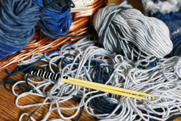 wool and knitting needles basket