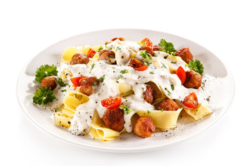 Pasta with meatballs and cream sauce