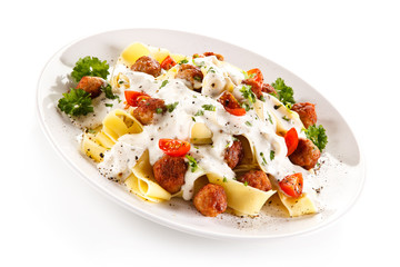 Pasta with meatballs and cream sauce
