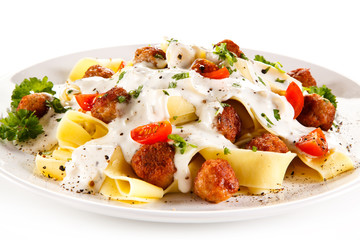 Pasta with meatballs and cream sauce