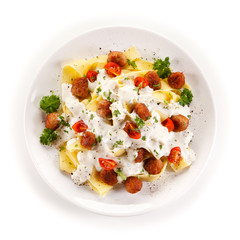 Pasta with meatballs and cream sauce
