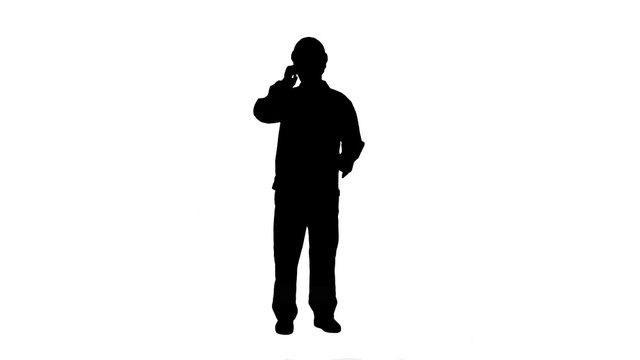 Silhouette Construction Worker talk with Cell Telephone track matte.