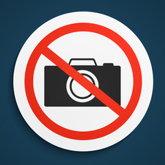 No Photos Sign on White Round Plate