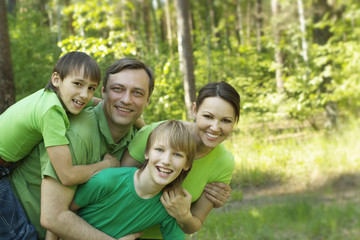 Fototapeta premium family in the summer park