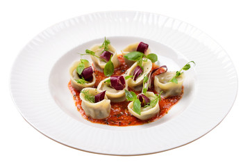 tortellini with mushrooms, and basil sauce, Italian food, isolat