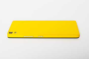 Yellow smartphone on a white background.