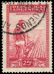 Stamp printed by Argentina shows Farmer Plowing