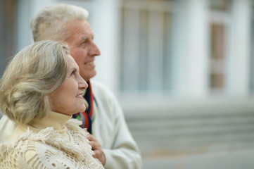 Mature couple walking in town