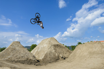 Man Does Somersaults on Bike