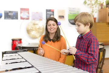Kid Studying Percussion Instrument