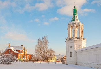 Winter rural landscape with the monastery tower in Rostov Veliky