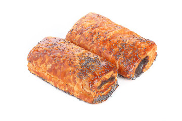 Croissant from flaky pastry with poppy on a white background