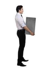 Asian business man lift heavy box