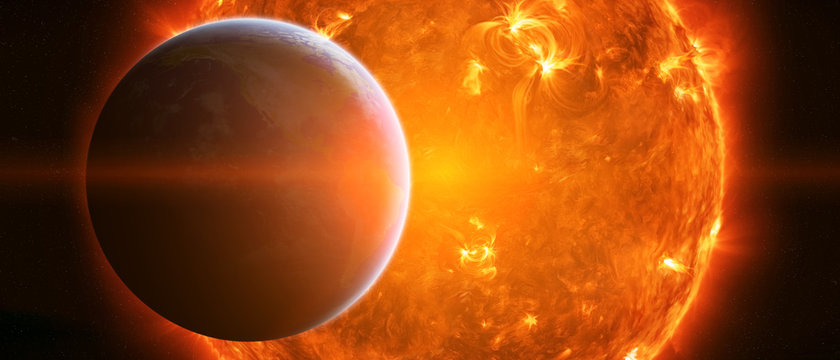 Exploding sun in space close to planet Earth