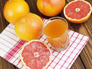 Obraz na płótnie Canvas grapefruit juice in glass
