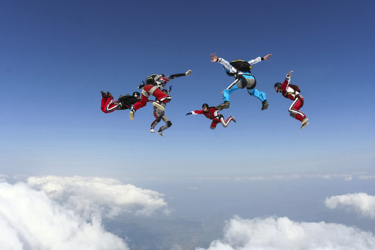 Group of skydivers in freefall.